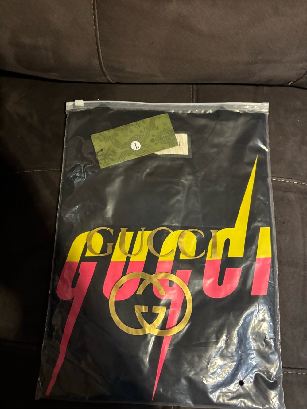 Gucci Black Tee with Yellow & Pink Graphic Logo